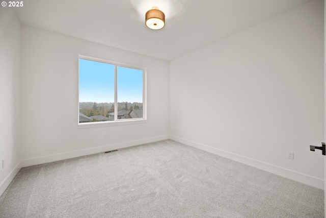 118 W 13th Way, La Center, WA 98629 - carpeted spare room featuring baseboards