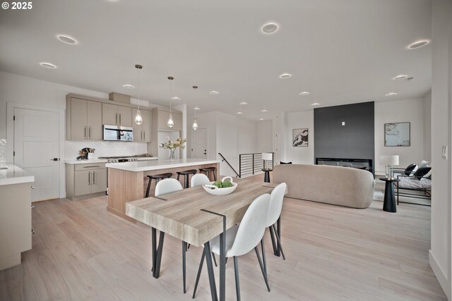 118 W 13th Way, La Center, WA 98629 - dining room featuring light wood-style flooring and recessed lighting