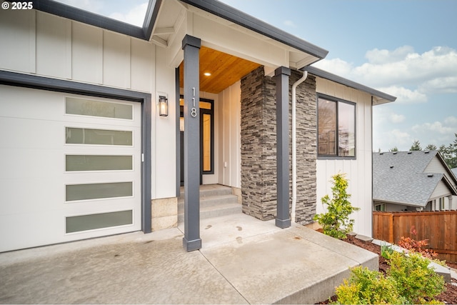 118 W 13th Way, La Center, WA 98629 - entrance to property with stone siding, board and batten siding, and a garage