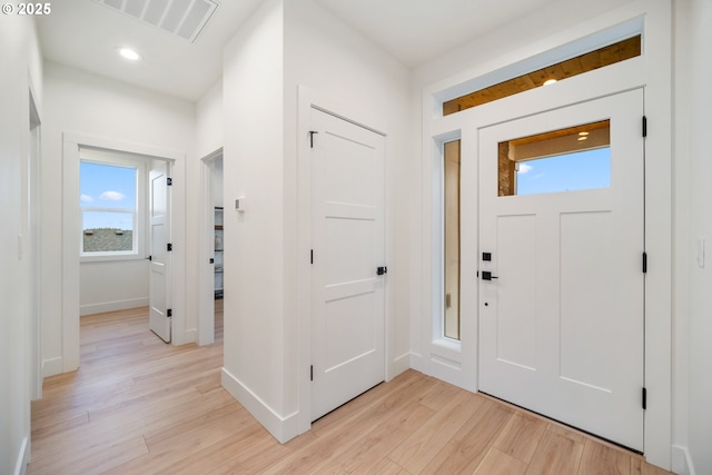 118 W 13th Way, La Center, WA 98629 - foyer entrance with light wood finished floors, baseboards, and recessed lighting