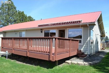 rear view of house with a deck