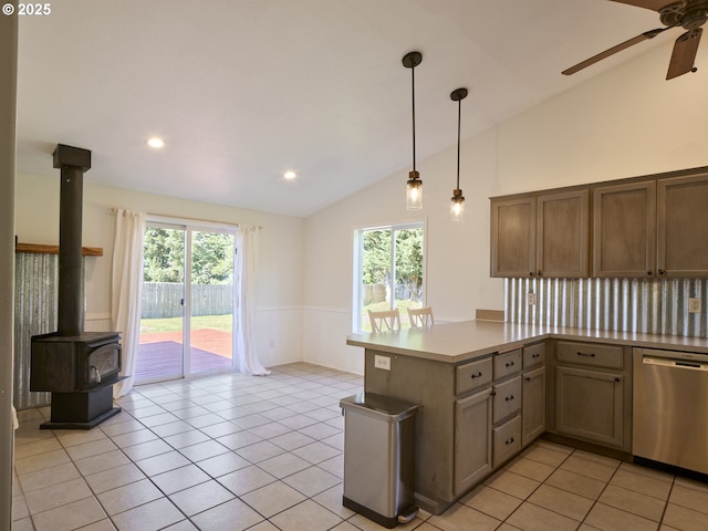 503 E Yacolt Rd, Yacolt, WA 98675 - kitchen with dishwasher, lofted ceiling, a ceiling fan, wainscoting, and light countertops