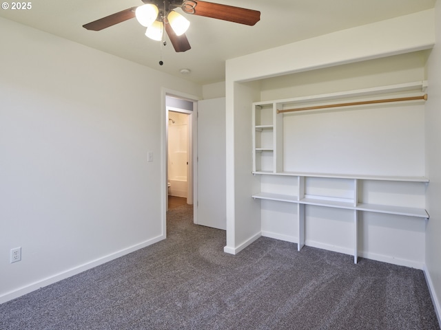 503 E Yacolt Rd, Yacolt, WA 98675 - unfurnished bedroom with dark colored carpet, ceiling fan, and a closet