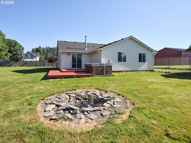 503 E Yacolt Rd, Yacolt, WA 98675 - rear view of property featuring a hot tub, a wooden deck, a fire pit, and crawl space