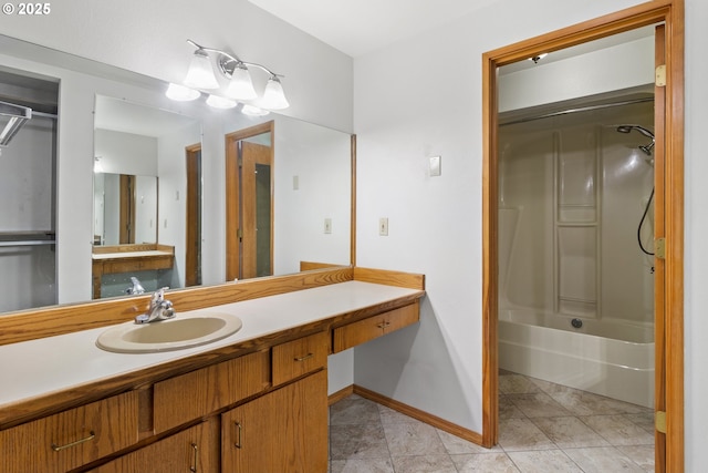 bathroom featuring baseboards, shower / tub combination, vanity, and tile patterned floors