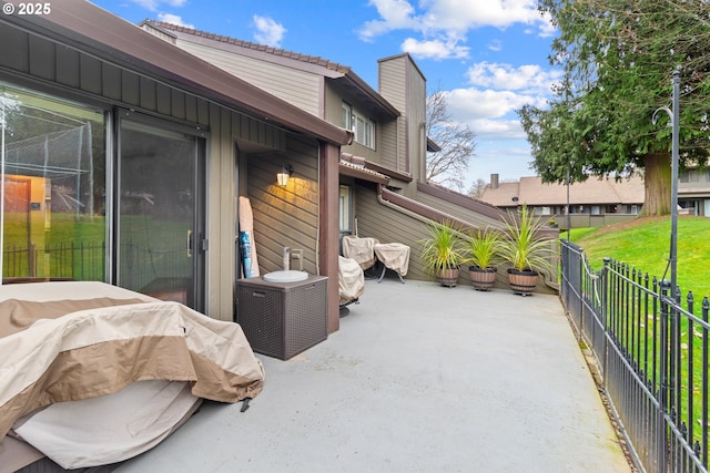 view of patio with fence