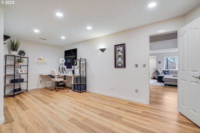 home office with recessed lighting, baseboards, and light wood-style flooring