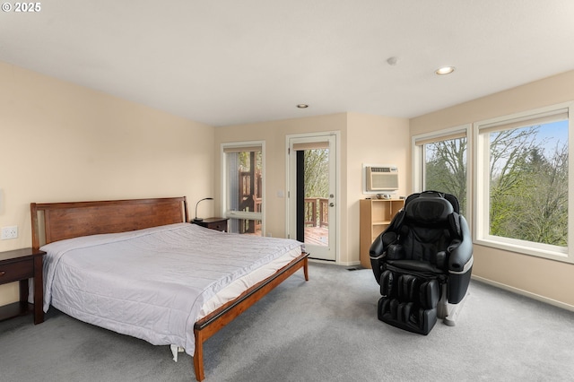 carpeted bedroom with access to outside, recessed lighting, a wall unit AC, and baseboards