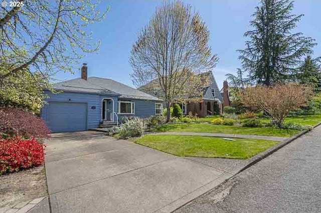 1910 Saginaw St S, Salem, OR 97302 - single story home featuring concrete driveway, a chimney, a garage, and a front lawn