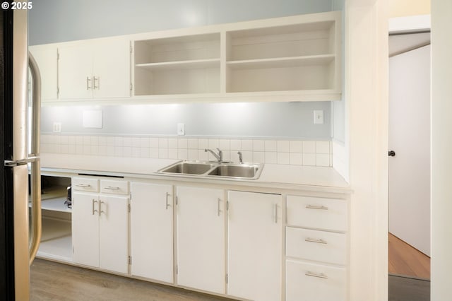 1963 Villard St, Eugene, OR 97403 - kitchen with open shelves, freestanding refrigerator, light countertops, and light wood finished floors