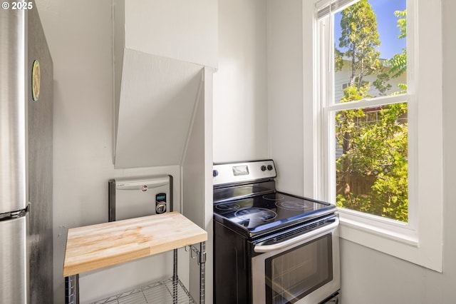 1963 Villard St, Eugene, OR 97403 - kitchen with stainless steel appliances and butcher block counters