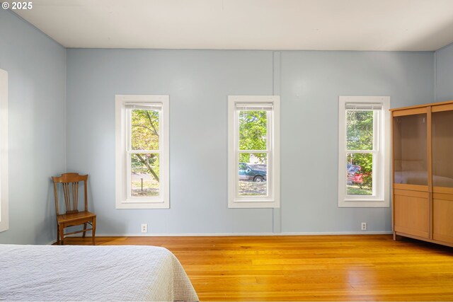 1963 Villard St, Eugene, OR 97403 - bedroom featuring multiple windows and wood finished floors