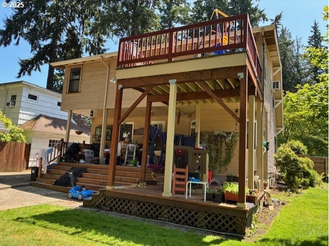 9615 NE Mason St, Portland, OR 97220 - back of property with a wooden deck and a lawn