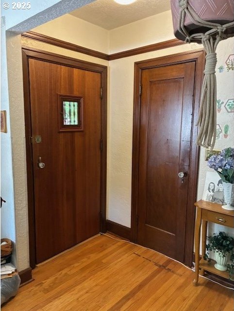 9615 NE Mason St, Portland, OR 97220 - entryway featuring light wood-type flooring and baseboards