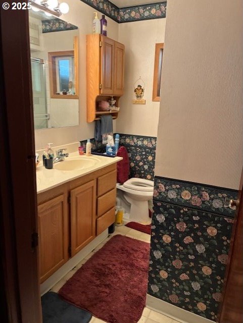 9615 NE Mason St, Portland, OR 97220 - full bath with a wainscoted wall, vanity, and an enclosed shower