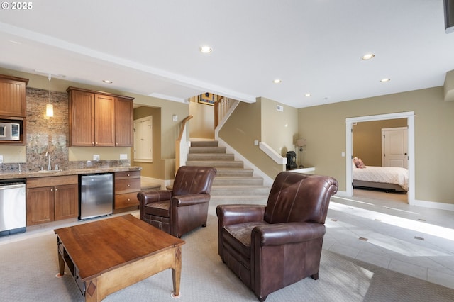 tiled living room featuring indoor wet bar