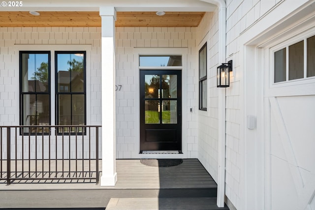 property entrance with a porch