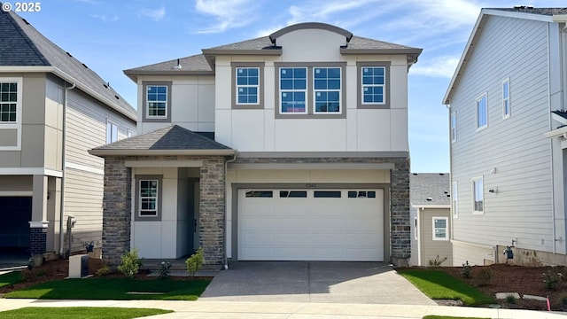 17940 SW Alvord Ln, Beaverton, OR 97007 - view of front of house with stone siding, concrete driveway, a shingled roof, a garage, and stucco siding