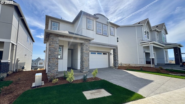 17940 SW Alvord Ln, Beaverton, OR 97007 - view of front of house with driveway, stone siding, and a garage