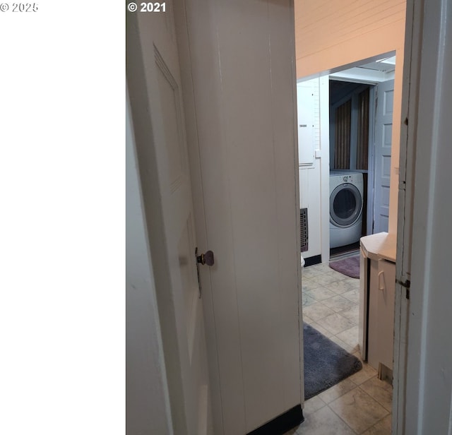 317 N Beacon St, Rockaway Beach, OR 97136 - hallway featuring washer / clothes dryer