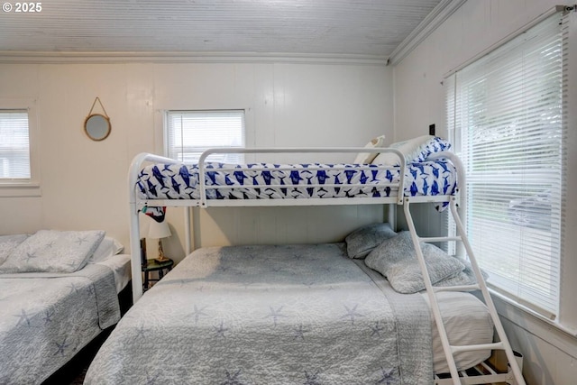 317 N Beacon St, Rockaway Beach, OR 97136 - bedroom featuring multiple windows and ornamental molding