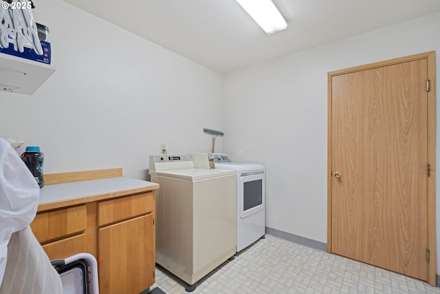9 N 20th St, Hood River, OR 97031 - laundry area featuring cabinet space and independent washer and dryer