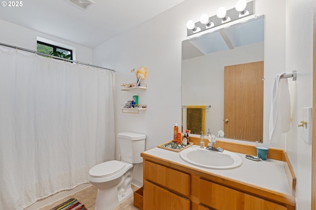 9 N 20th St, Hood River, OR 97031 - bathroom with toilet, vanity, and a shower with shower curtain