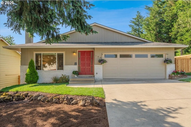 180 Nelson Ln, Gladstone, OR 97027 - ranch-style home featuring brick siding, a garage, concrete driveway, and a shingled roof