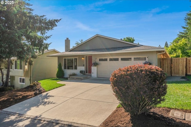 180 Nelson Ln, Gladstone, OR 97027 - ranch-style house with an attached garage, a chimney, and concrete driveway