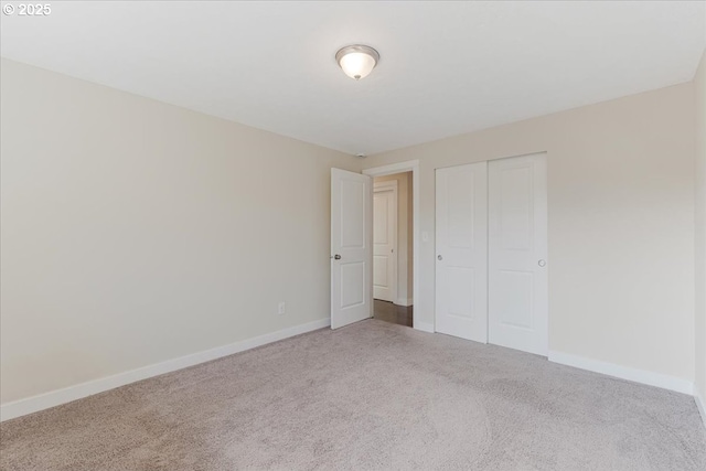 180 Nelson Ln, Gladstone, OR 97027 - unfurnished bedroom featuring carpet, baseboards, and a closet