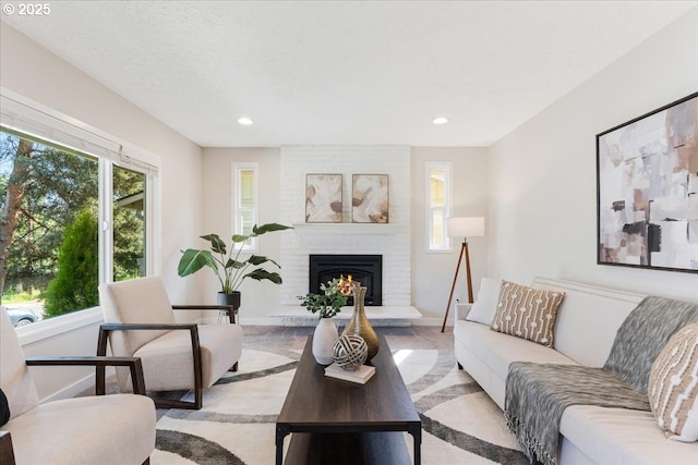 180 Nelson Ln, Gladstone, OR 97027 - living room featuring a fireplace, recessed lighting, and baseboards