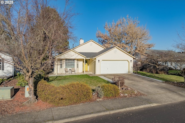 ranch-style home with a front yard and a garage