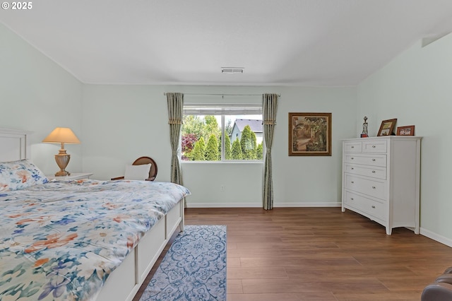 16085 SW Towhee Ln, Beaverton, OR 97007 - bedroom featuring dark wood-type flooring and baseboards
