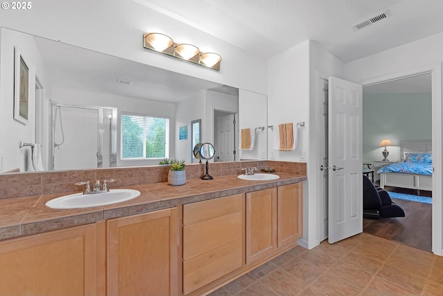 16085 SW Towhee Ln, Beaverton, OR 97007 - full bath with ensuite bathroom, double vanity, and a stall shower