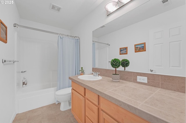 16085 SW Towhee Ln, Beaverton, OR 97007 - full bathroom featuring shower / bath combo, toilet, and vanity