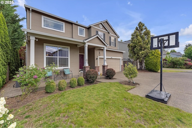 16085 SW Towhee Ln, Beaverton, OR 97007 - view of front of house with driveway, a front yard, covered porch, and an attached garage
