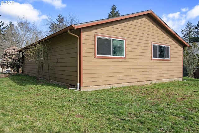 view of property exterior featuring a yard