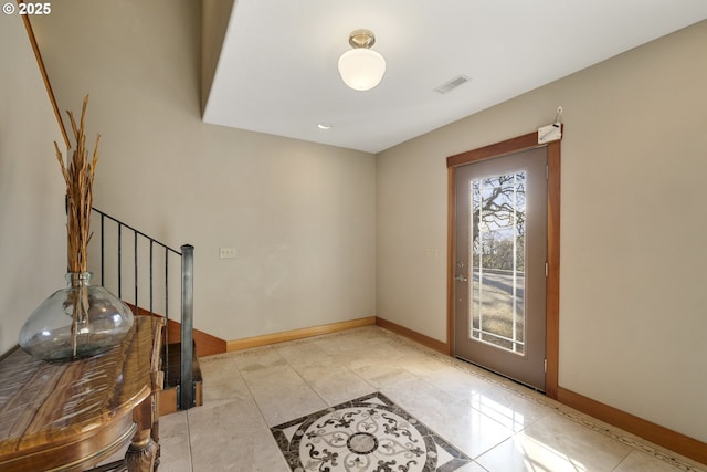 625 Columbia Ave, Lyle, WA 98635 - foyer entrance featuring inlaid floor details, baseboards, and stairs