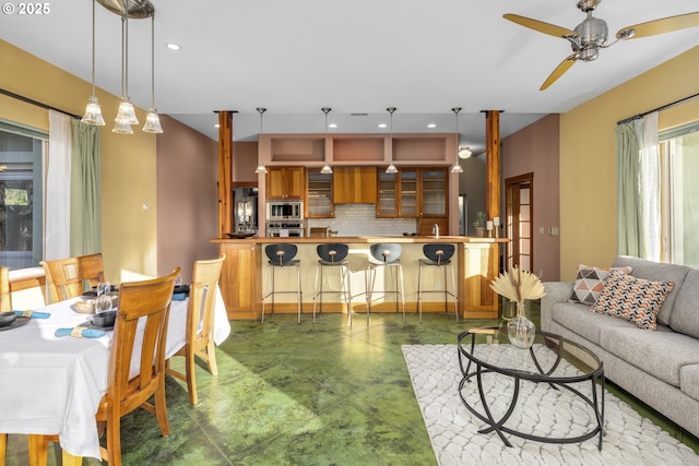 625 Columbia Ave, Lyle, WA 98635 - living area with finished concrete floors, recessed lighting, and ceiling fan