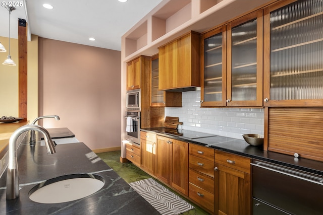 625 Columbia Ave, Lyle, WA 98635 - kitchen featuring appliances with stainless steel finishes, a sink, brown cabinetry, backsplash, and recessed lighting