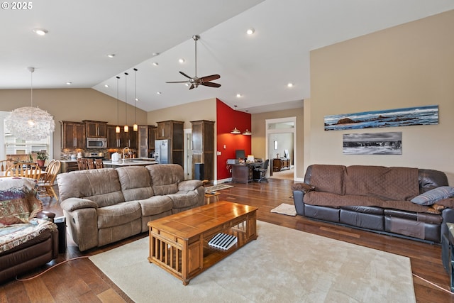 living room with lofted ceiling, wood finished floors, ceiling fan, and recessed lighting
