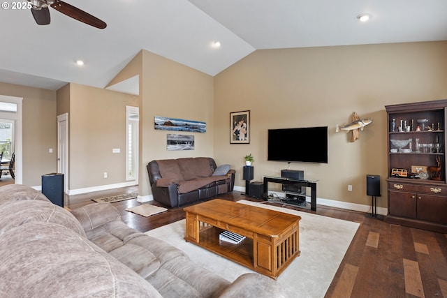 living room with dark wood finished floors, ceiling fan, baseboards, recessed lighting, and high vaulted ceiling