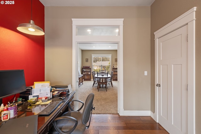 office featuring wood finished floors and baseboards