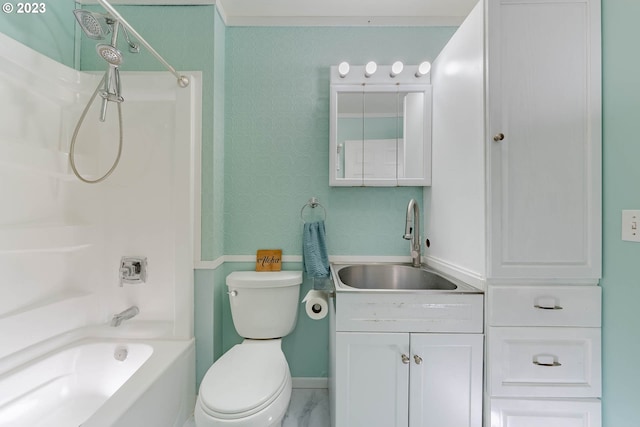 bathroom featuring toilet,  shower combination, baseboards, and vanity