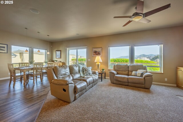 1587 NW 39th St, Lincoln City, OR 97367 - living room with baseboards and ceiling fan