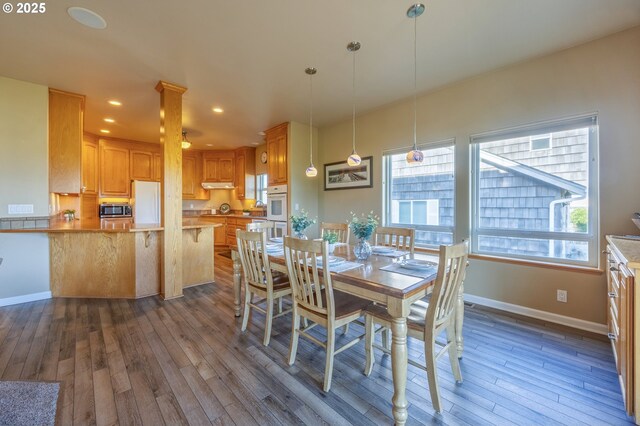 1587 NW 39th St, Lincoln City, OR 97367 - dining space with recessed lighting, baseboards, and dark wood finished floors