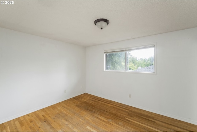 730 SW Dolph St, Portland, OR 97219 - unfurnished room with light wood-style floors and baseboards