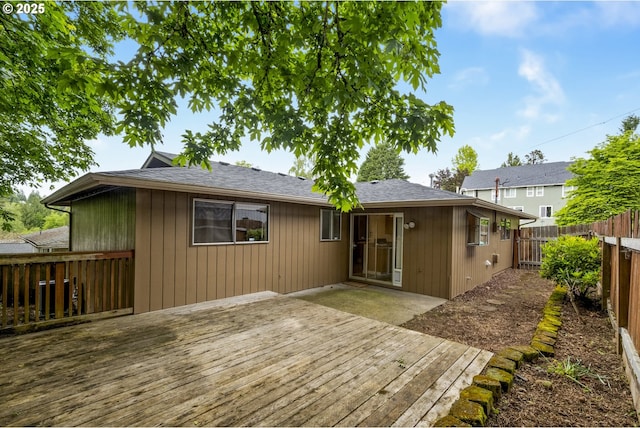 730 SW Dolph St, Portland, OR 97219 - back of house featuring a fenced backyard, a deck, and roof with shingles
