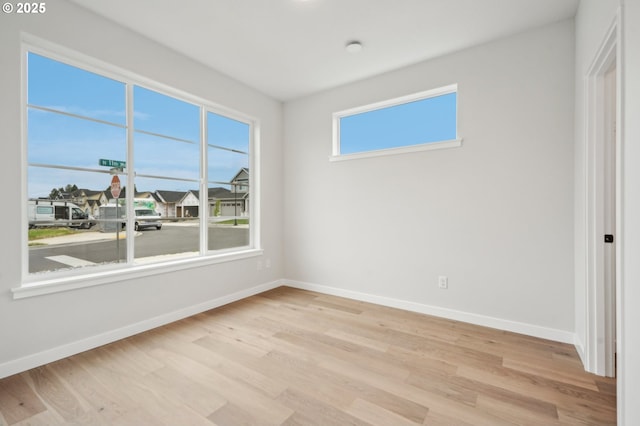 4321 N 11th Way, Ridgefield, WA 98642 - spare room featuring baseboards and wood finished floors