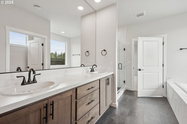 4321 N 11th Way, Ridgefield, WA 98642 - bathroom with a stall shower, a garden tub, double vanity, and recessed lighting